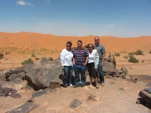 Traveling with family members through the Sahara desert near Taouz in Morocco.